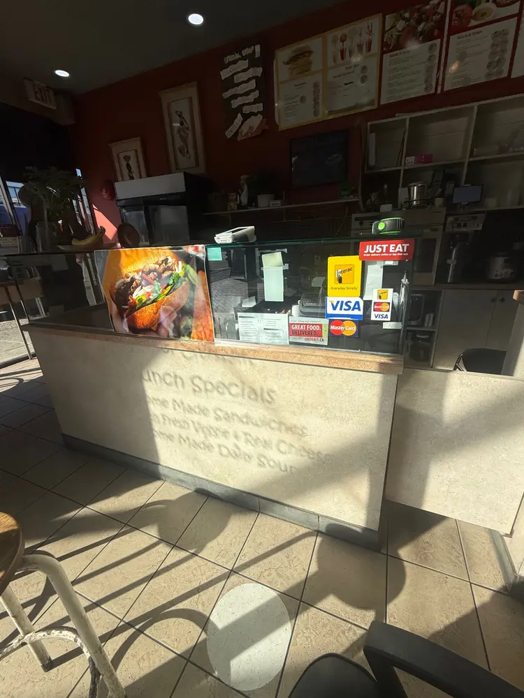 Existing service counter and showcase before refinishing